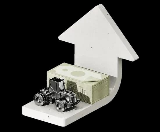 Стопка купюр і маленький трактор, розміщені на платформі зі стрілкою, що вказує вгору