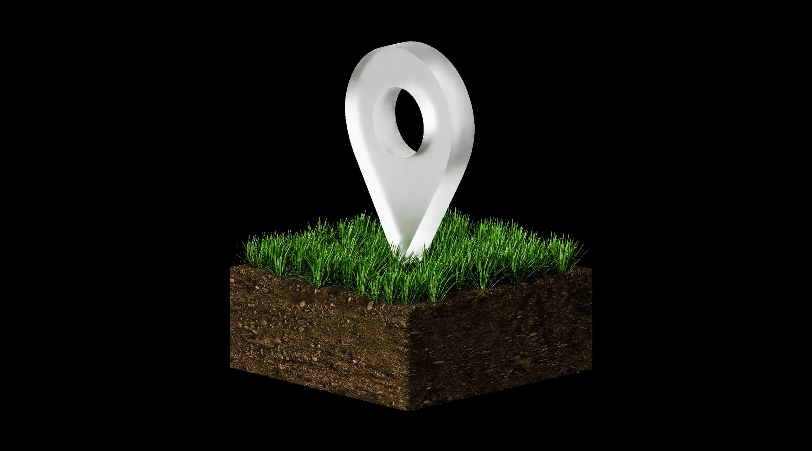 Позначка‑локація встановлена на кубі з трав’яним покриттям